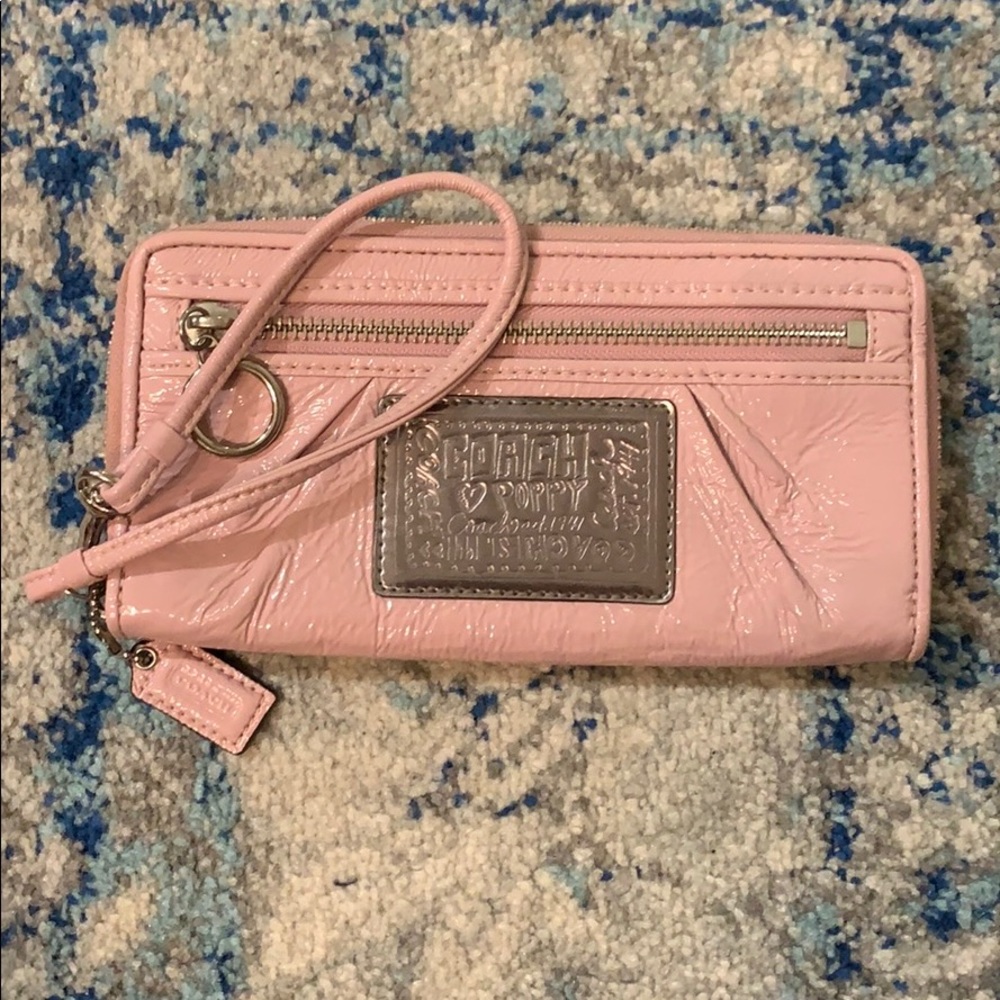 Coach light pink wristlet